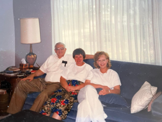 Fred and Bev at moms funeral, with others