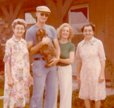 Picture of Mom (Hilda), Jim, Clyde (the dog), Gail and Aunt Freida