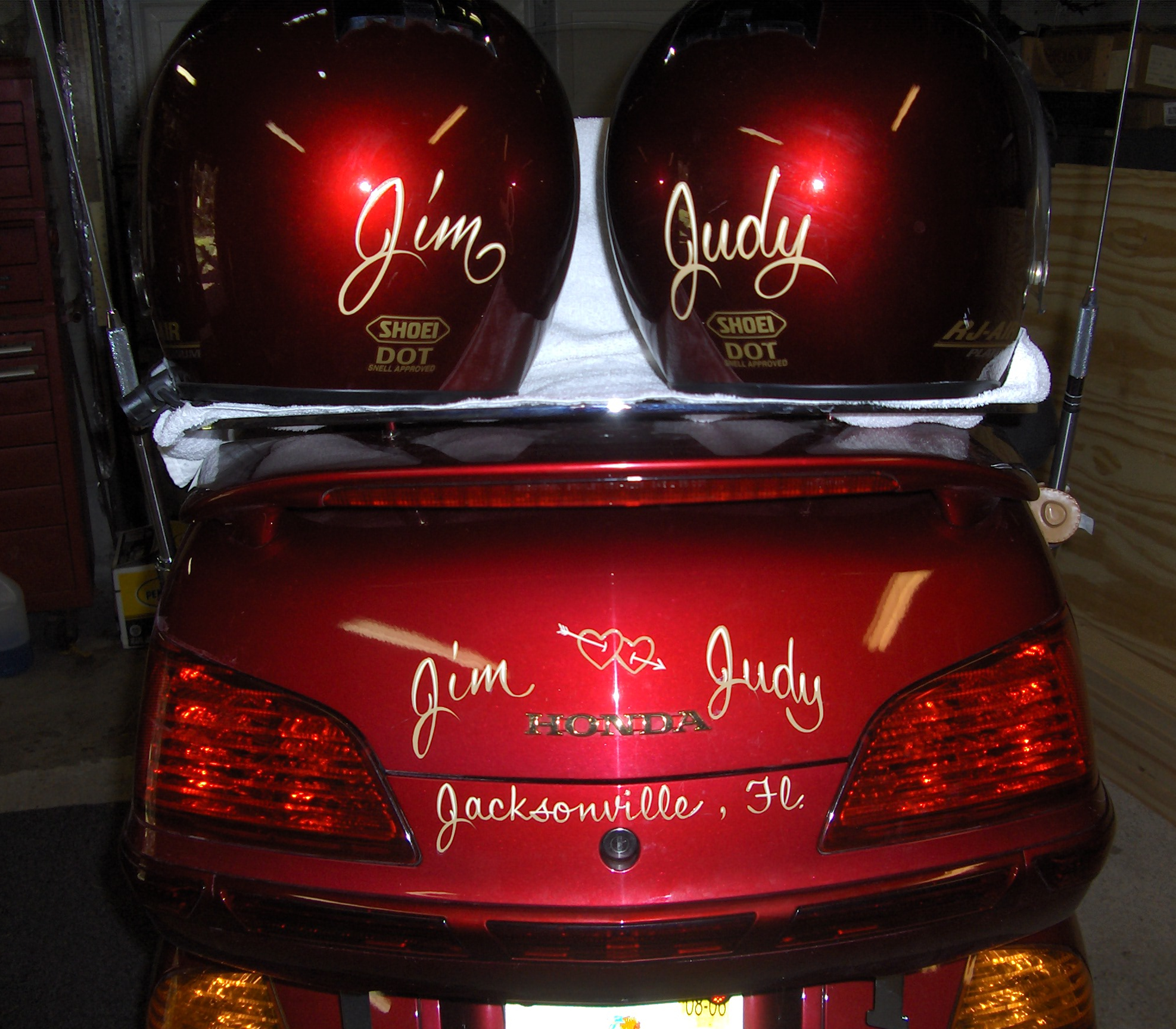 Jim & Judy on trunk of Big Red, Honda GL1800.