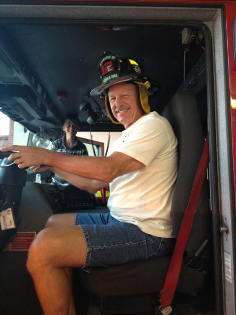 Truck Driver Bob with a Fireman's helmet
