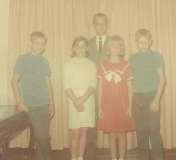 Old picture of Sam, Jan, Diane and Bob, with Jim in the back row.
