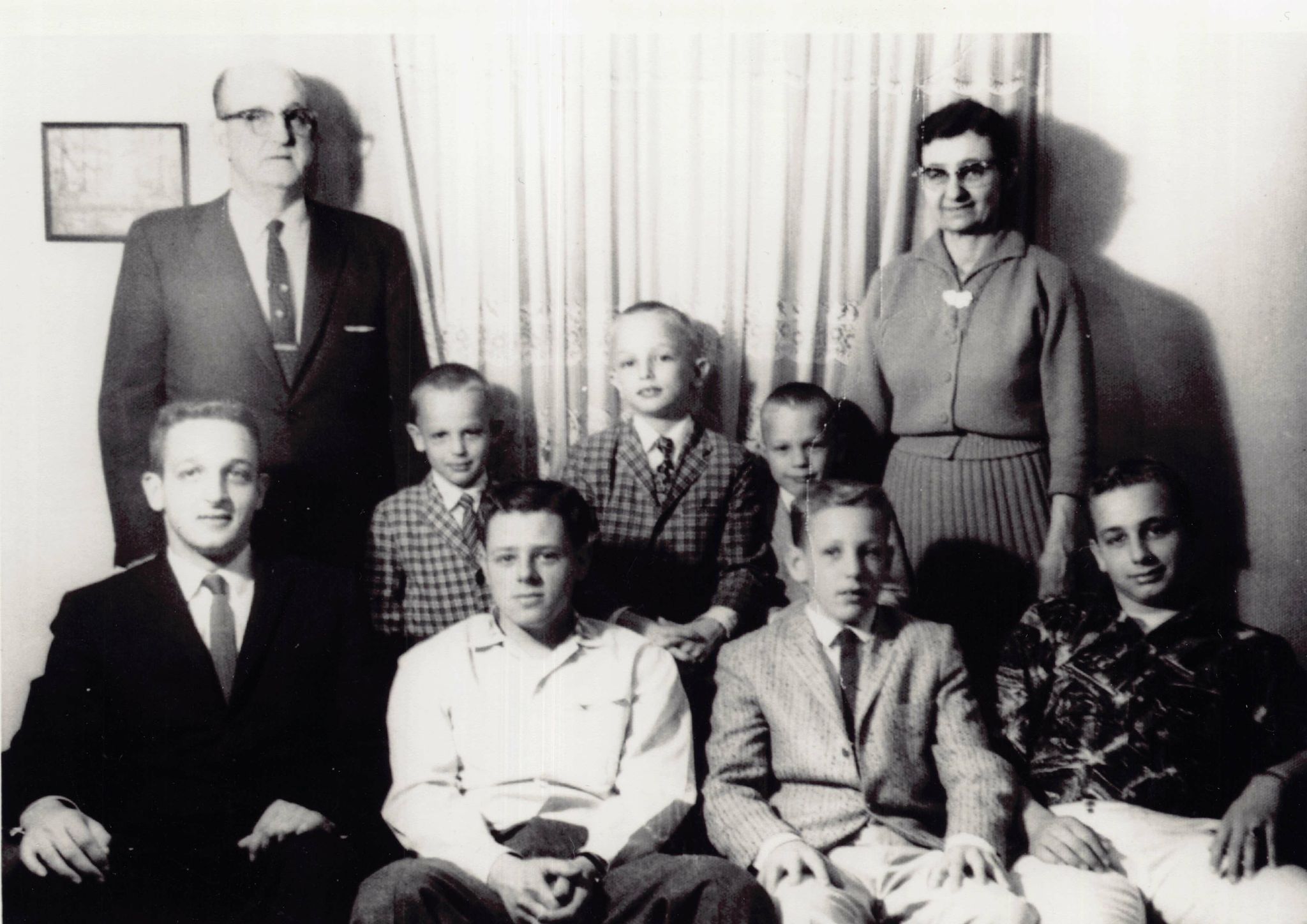 Front Row is Fred, Chuck, Johnny, Bill and the Back row is Dad, with Sammy, Jimmy and Bobby in the middle and Mom on the end
